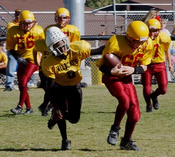 Andrew #66 carries ball against Boron - September 24, 2005