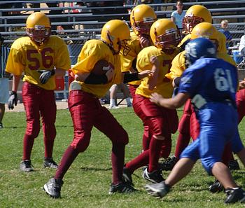 Andrew #66 carries against Bishop - October 1, 2005