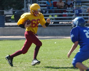 Andrew #66 carries against Bishop - October 1, 2005