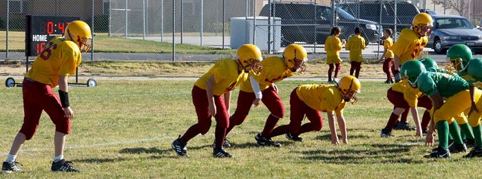 Andrew #66 on right - Junior defense lines up against California City - October 8, 2005