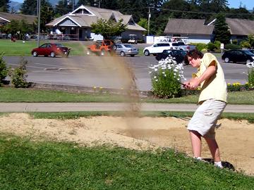 Practicing getting out of a sand trap - July 17, 2008