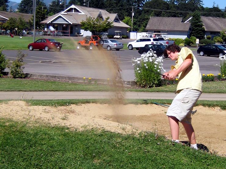 Practicing getting out of sand trap at Riverridge - July 17, 2008