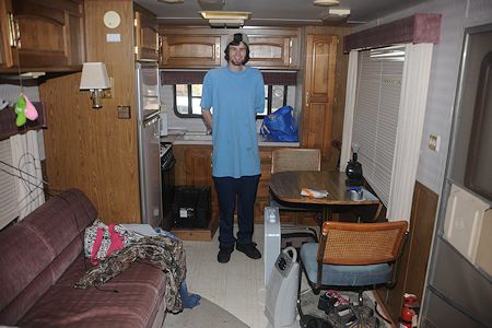 Andrew and his trailer home living room and kitchen - July 6, 2014