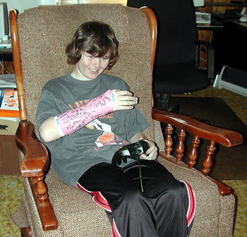 Andrew Cole with arm cast - March 9, 2004