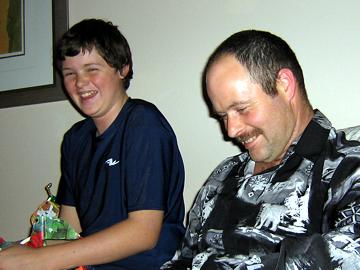 Me and my dad enjoy our Christmas gifts - December 24, 2006
