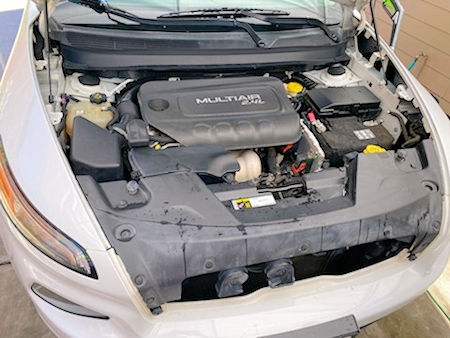 Jeep Cherokee engine compartment after being detailed