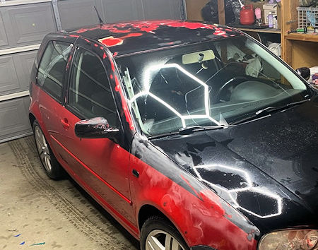 2003 Volkswagen Gti showing deteriorated paint on roof and fender