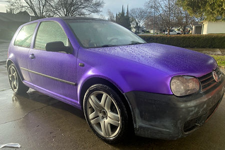 2003 Volkswagen Gti with wrap replacing damaged paint